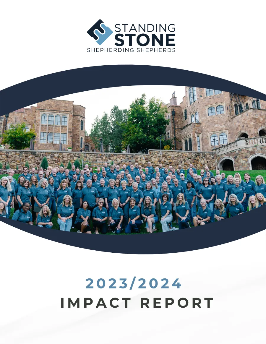 Cover of Standing Stone's 2023 to 2024 Impact Report. The image shows a large group of shepherds gathered together outside.