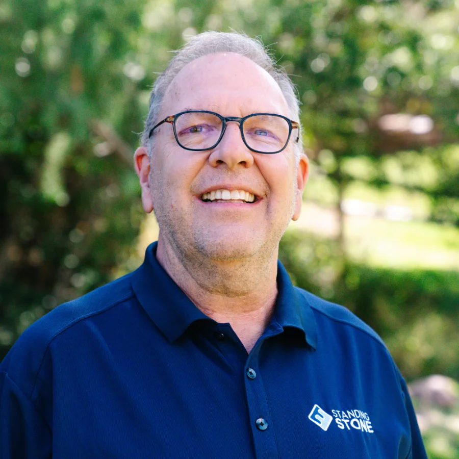 headshot of John Duval
